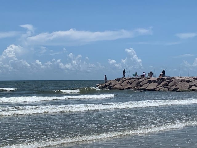 people fishing on Galveston jetty