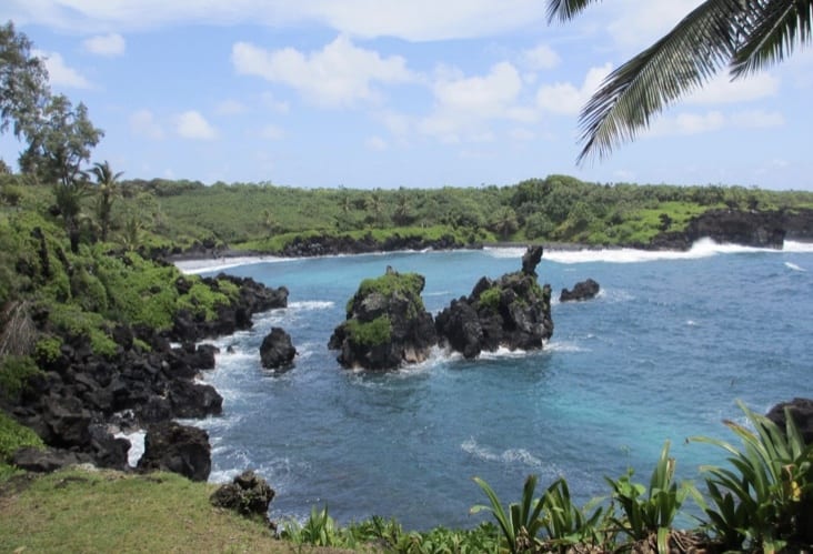 cliff divers jump from these rocks on the Wai’anapanapa Coast Trail South on the Road to Hana