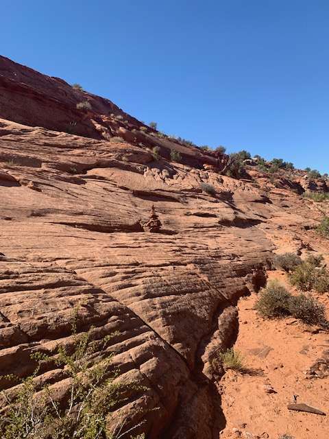 Slick rock incline on trail to Peek-a-Boo Slot Canyon